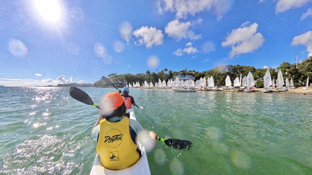 My daughter and I paddling by Kohimarama Yacht Club